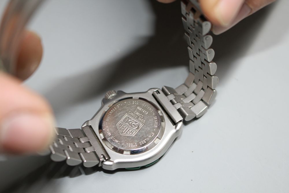 A ladys stainless steel Tag Heuer Professional quartz wrist watch, on Tag bracelet.